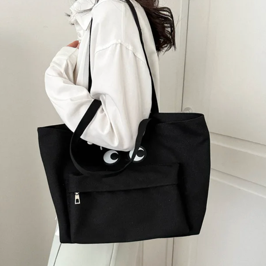 Living Beauty - Black Eyes Tote Bag