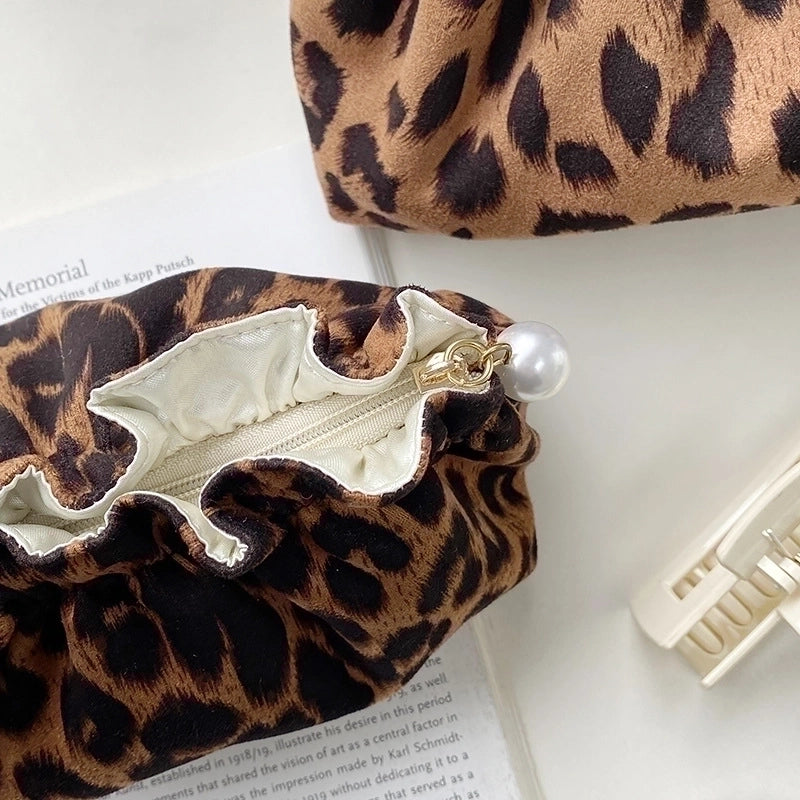 Living Beauty Leopard Ruffle Pearl Zip Clutch