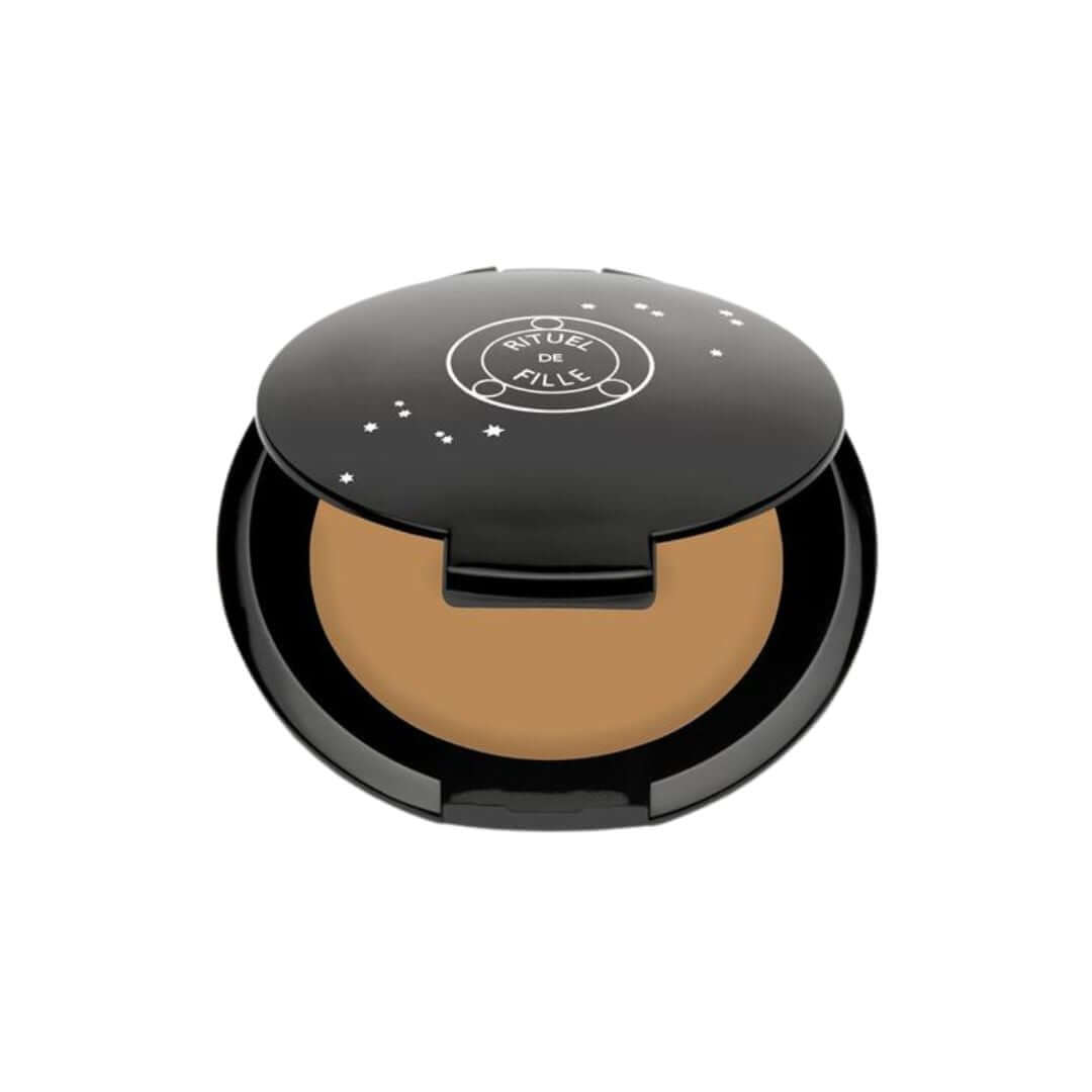Eris - Medium to deep concealer and foundation balm with golden undertones.