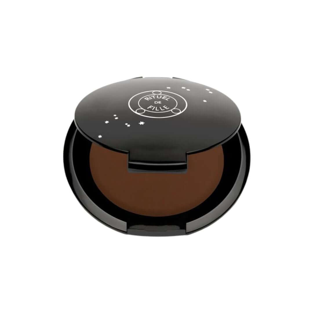 Cyllene - Deep concealer and foundation balm with warm golden undertones.